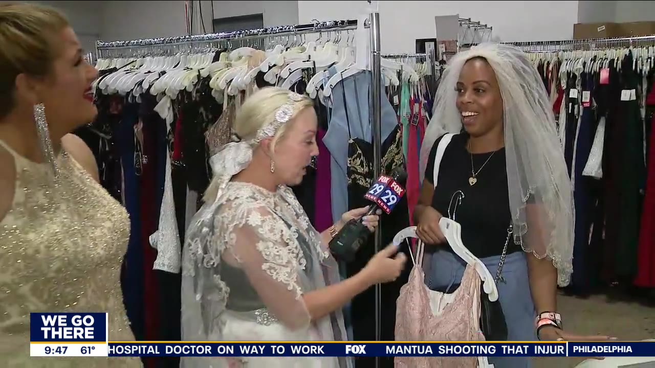 Bride-to-be shows off wedding gown, post-wedding dress
